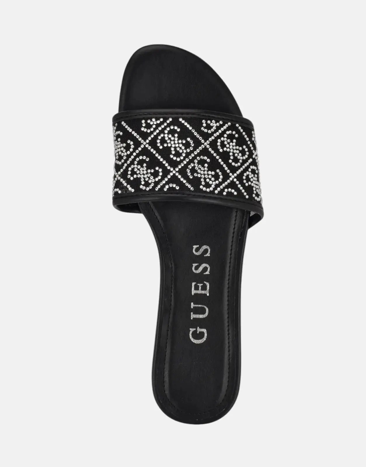 Guess Horaey black sandal with adjustable ankle strap, side view.