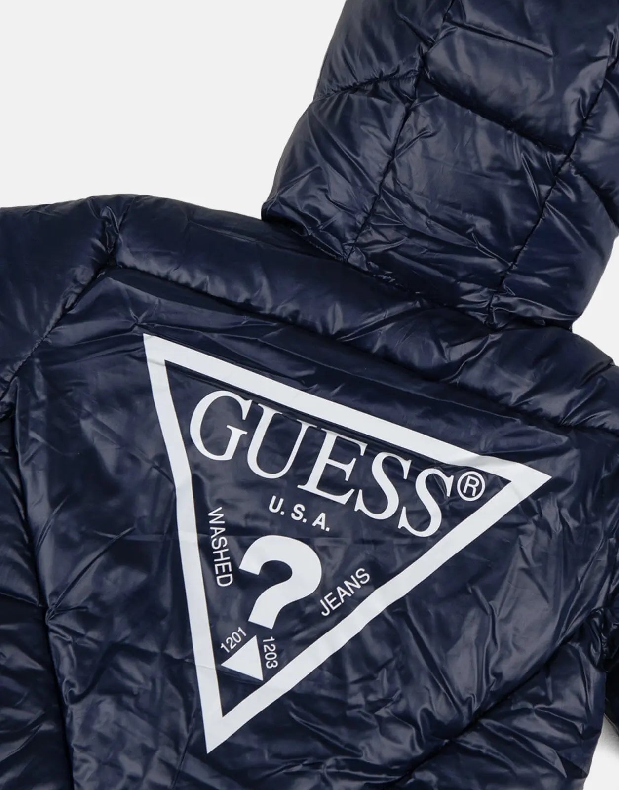 Guess Kids navy hooded puffer jacket with logo on chest.