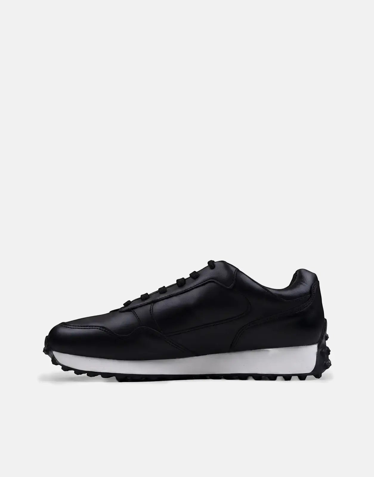 Ben Sherman Arthur black leather sneaker with a white sole, viewed from the side profile on a clean background.