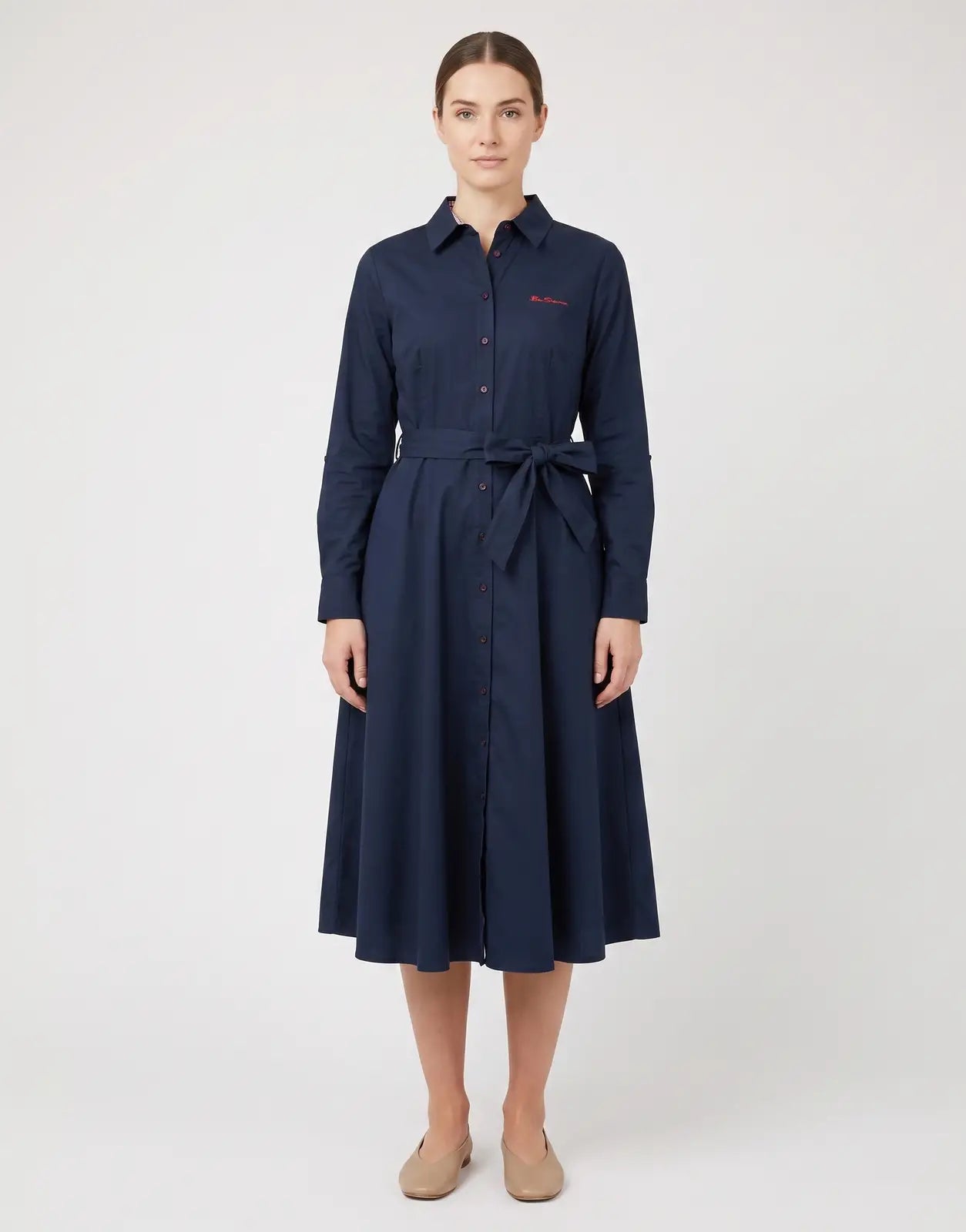 Ben Sherman Diana Fit & Flare Navy Dress with long sleeves, a collared neckline, full button front, and a self-tie belt.