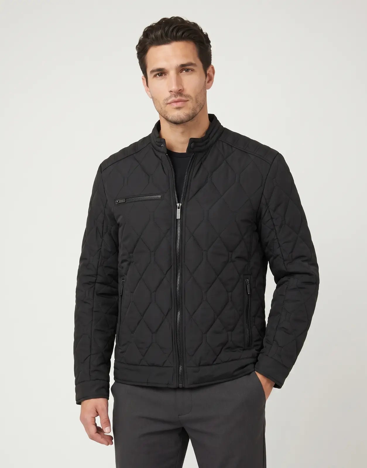 Ben Sherman men's quilted black bomber jacket with a stand collar, full-zip front, and zippered pockets, presented in a