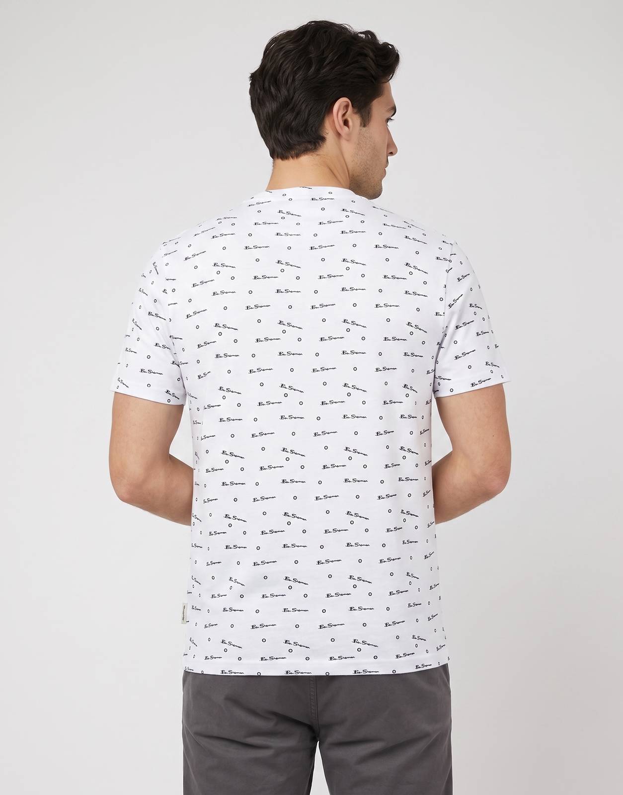 Ben Sherman Tar Aop White T-Shirt featuring an all-over black script logo and circle print, shown from the back.