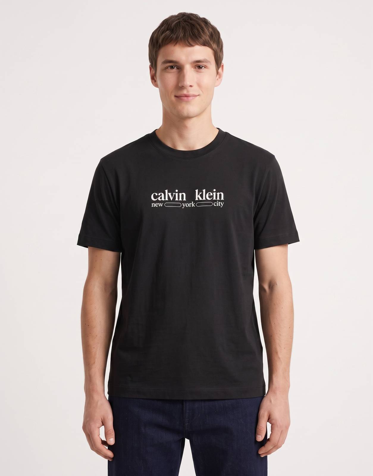 Front view of a men's Calvin Klein 30s WHSL NYC Graphic Black T-Shirt, featuring a white 'Calvin Klein new york city' logo