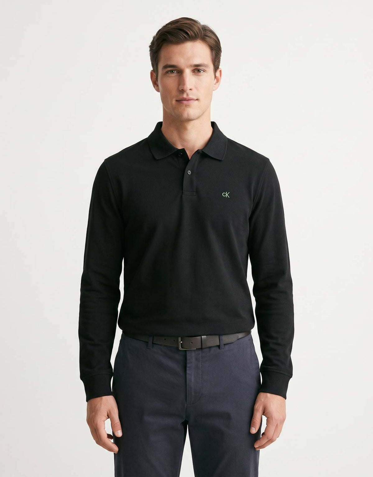 Calvin Klein Casual Pique Black Polo Shirt with long sleeves and a green 'CK' logo, shown from the front.