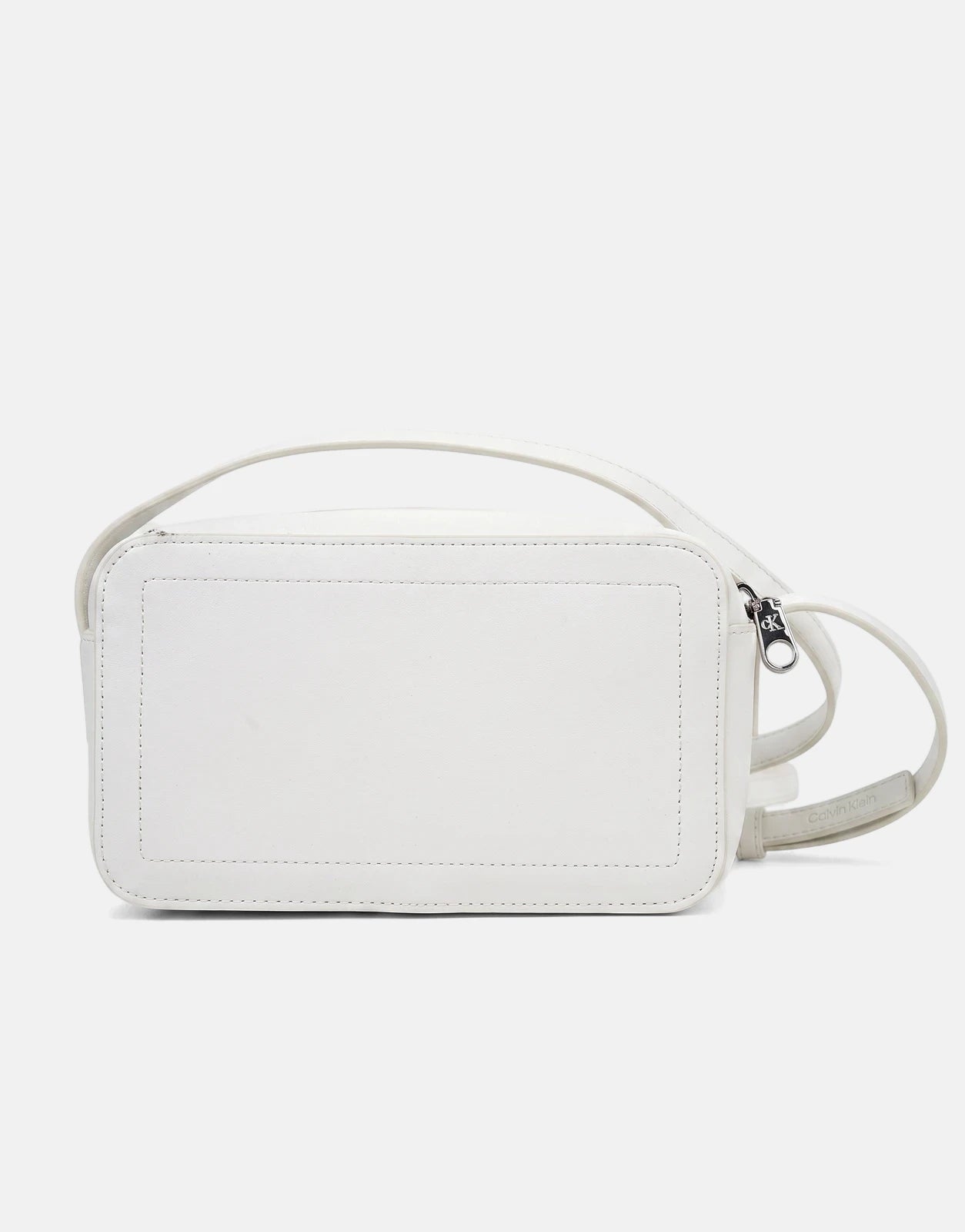 Calvin Klein Bold CK White Camera Bag, displayed from a slightly elevated view, showcasing its smooth texture and clean
