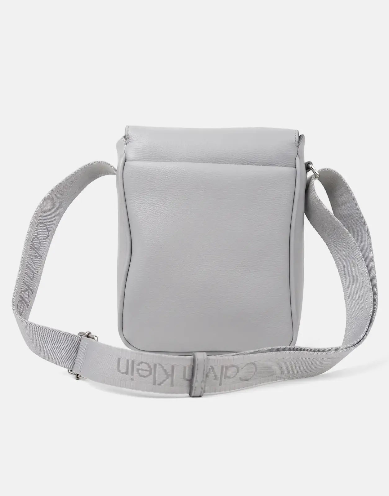 Grey Calvin Klein Cargo Flap Reporter Bag with pebbled texture and branded strap, shown from the front.