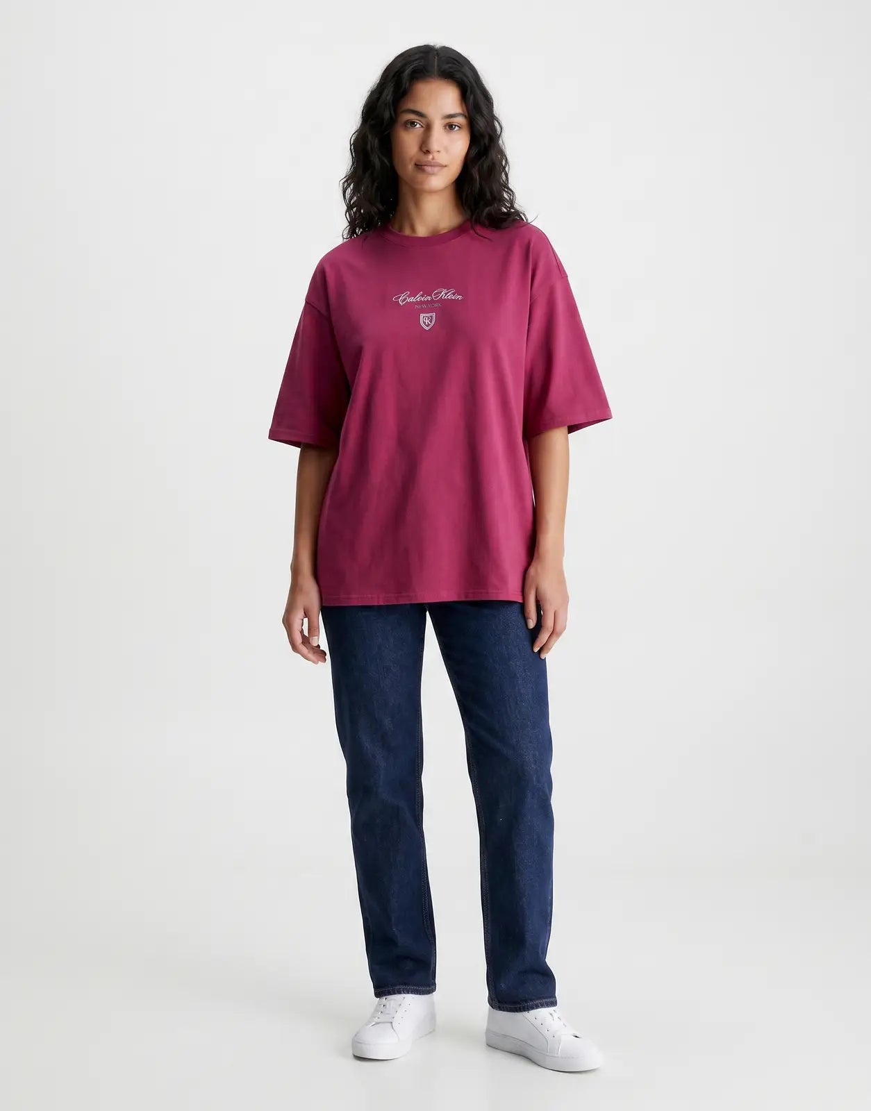 Calvin Klein CK NY oversized berry t-shirt for women, featuring a prominent 'Calvin Klein New York' logo on the front with