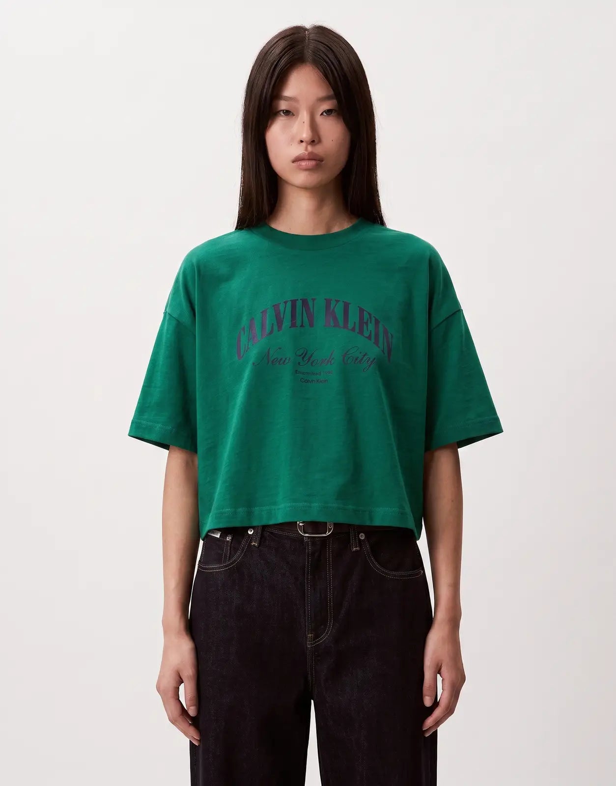 Calvin Klein women's cropped boxy heritage crest logo t-shirt in green cotton, shown from the front.