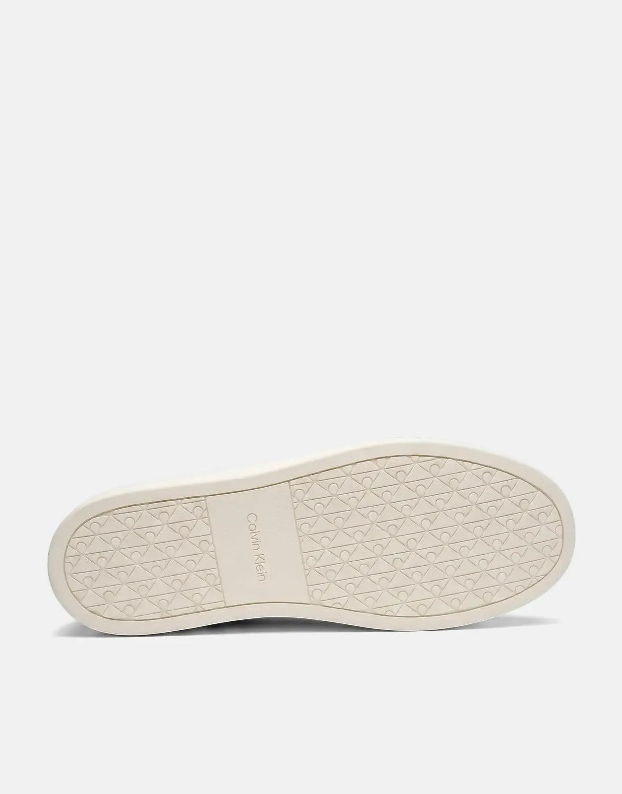 Calvin Klein Hybrid Clean Cup dark brown loafer sole, showing the brand name and textured geometric tread pattern in cream.