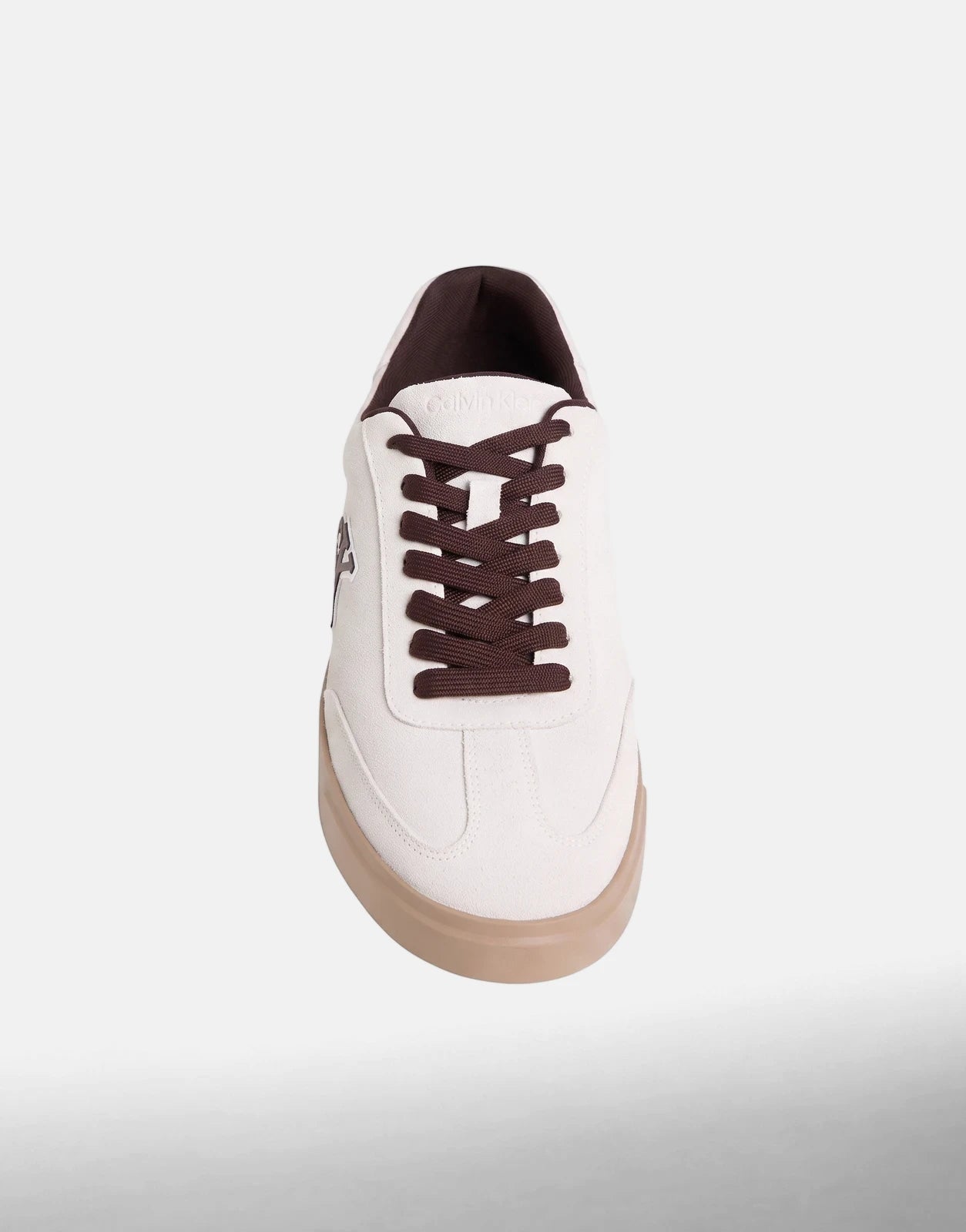 Calvin Klein Low Prof White Multi Cupsole Sneakers with brown laces and tan sole, shown from a slightly angled front view.