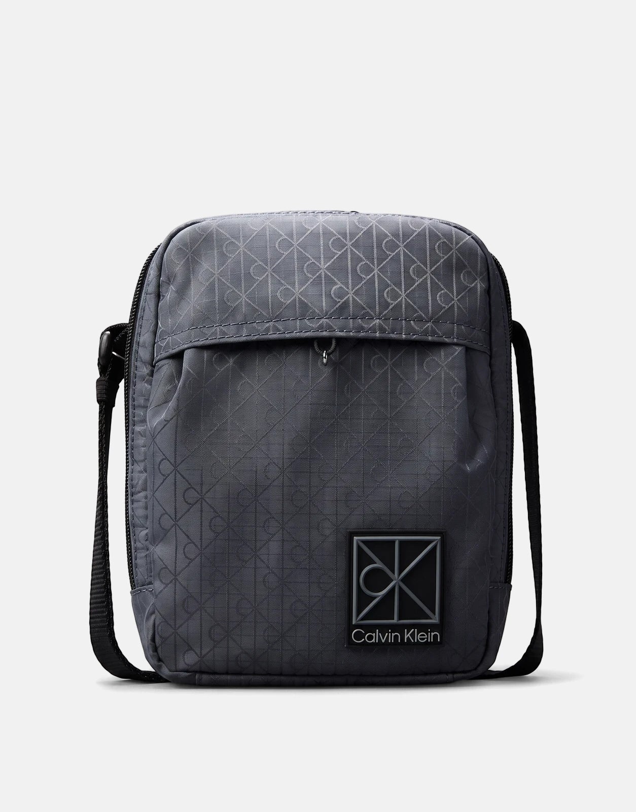 Calvin Klein Utility Emblem Blue Grey Reporter Bag, showcasing its textured fabric, black adjustable strap, and front logo