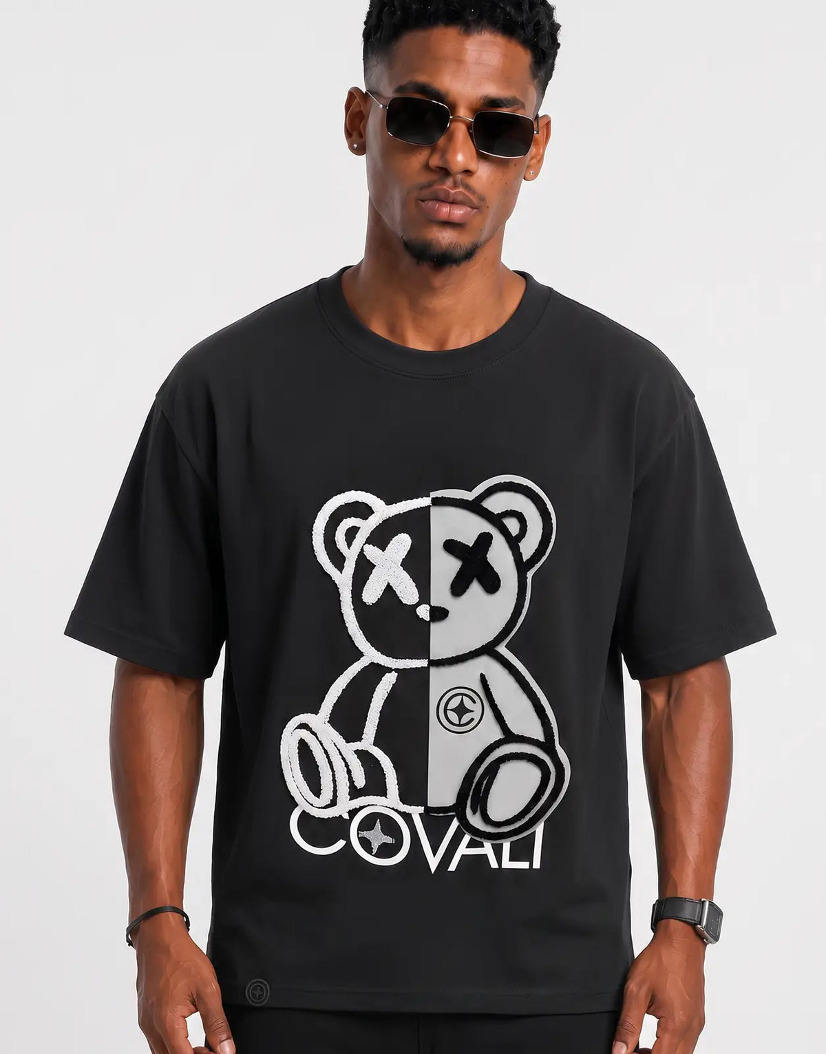Covali Forzi black short-sleeve t-shirt for men, featuring a distinct black and white split teddy bear graphic on the front.