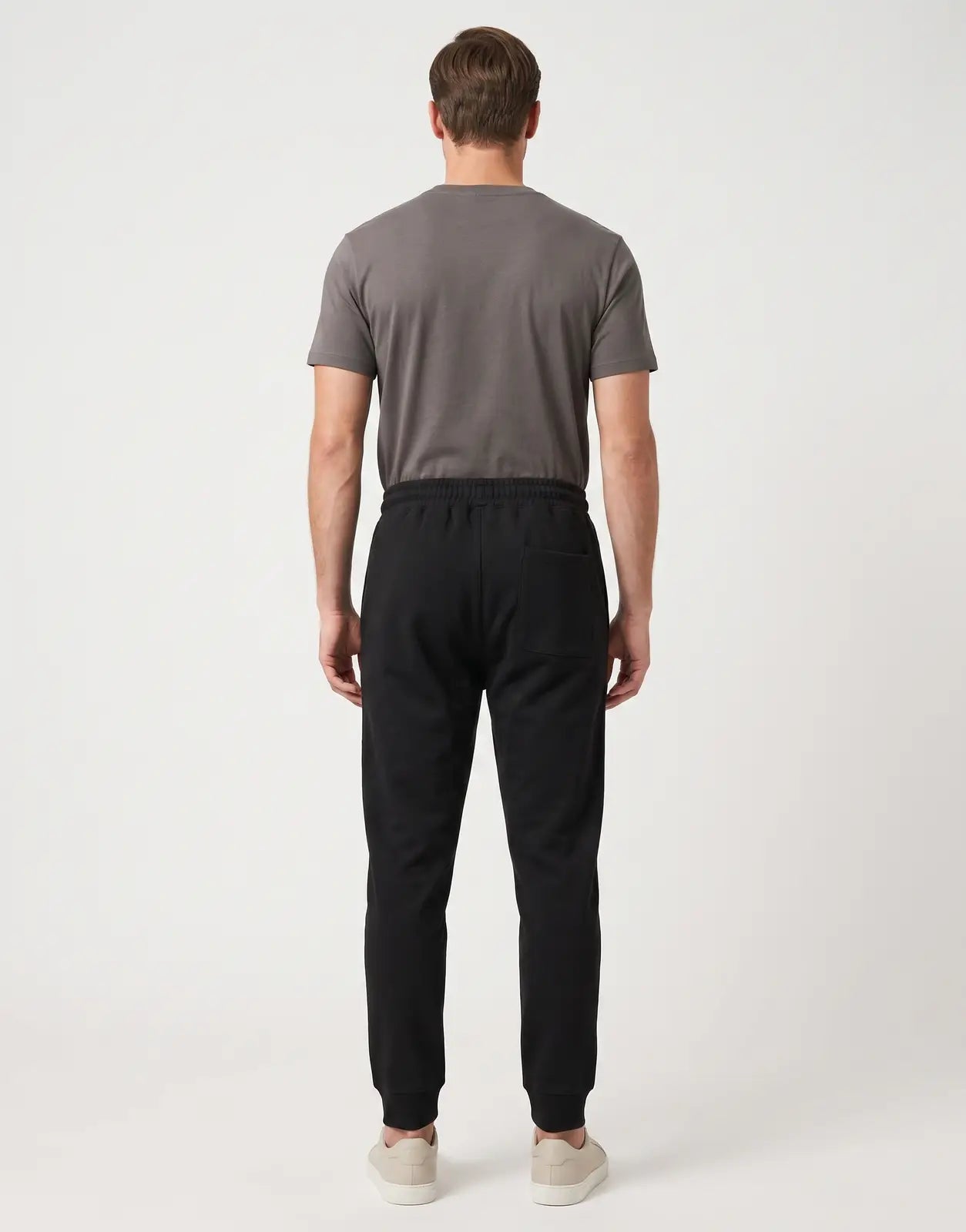 Men's black Covali Italiano-Sp Sweatpants, featuring an elastic waistband and a single back patch pocket, shown from the