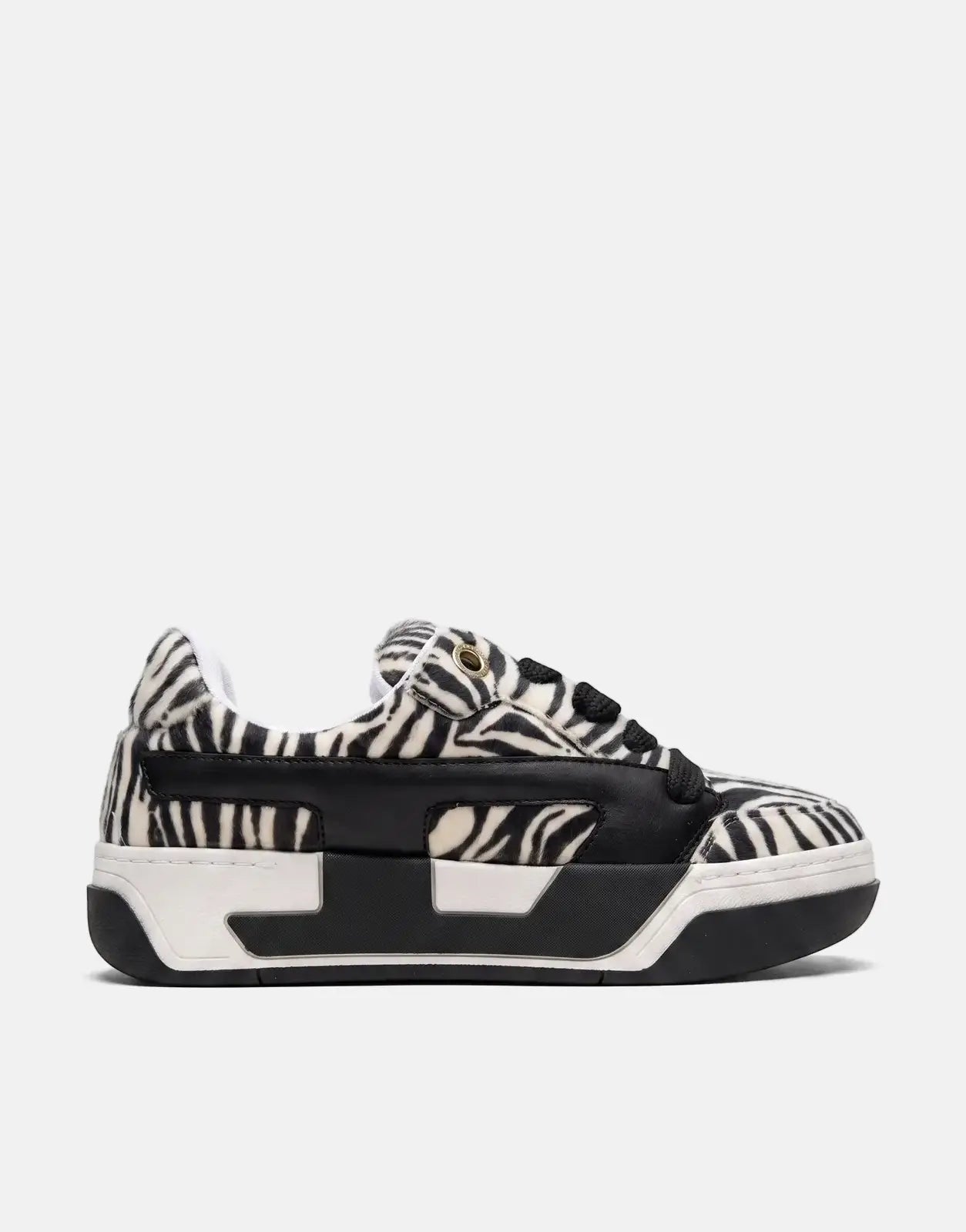 Diesel D-Ollie Low Sneaker, black and white zebra print, with black leather details and a chunky sole. Side view.