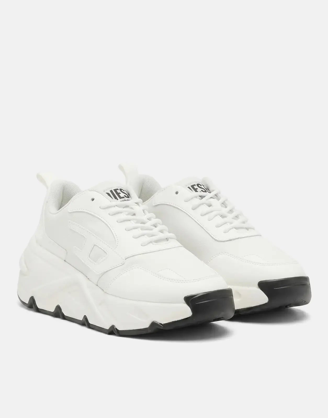 A pair of white Diesel S-Savannah Tulu sneakers with chunky soles and black accents, featuring lace-up fronts.