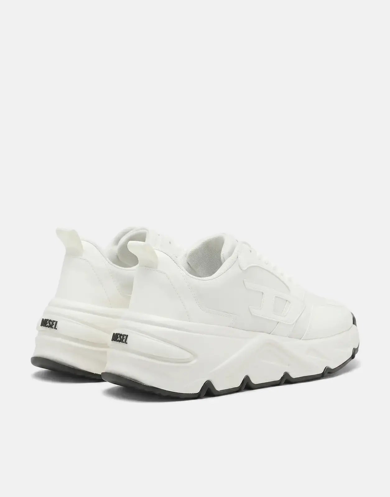 White Diesel S-Savannah Tulu sneakers featuring a chunky platform sole and black accents, shown from a rear-quarter view.