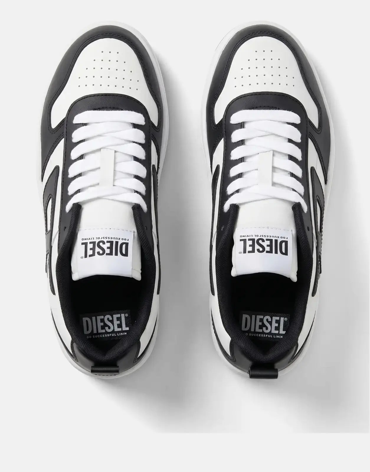 Pair of Diesel S-Ukiyo V2 Low Sneakers in black and white, viewed from directly above on a clean background.