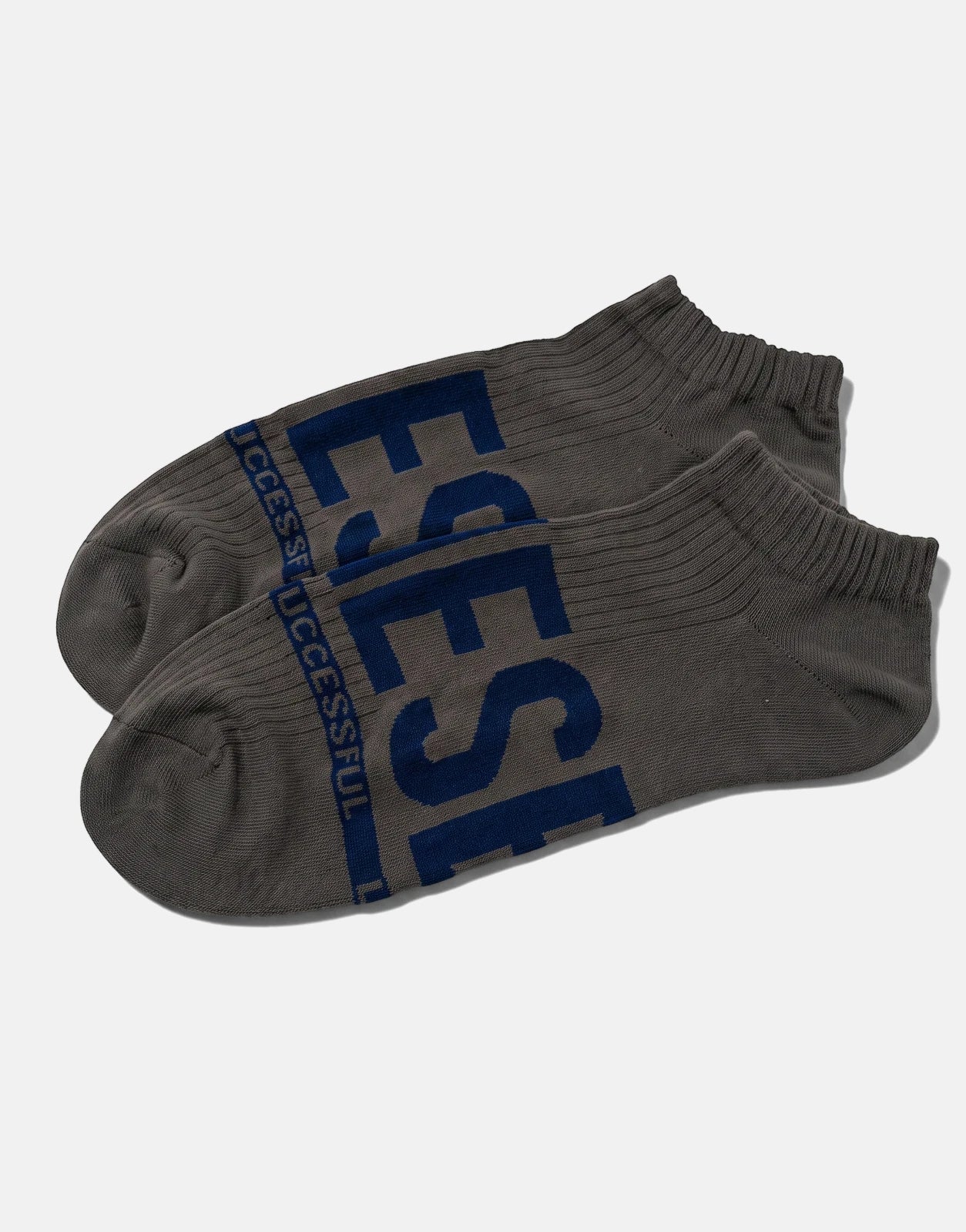 Two grey Diesel SKM Gost ankle socks with blue 'SUCCESSFUL' branding, laid flat on a white surface.