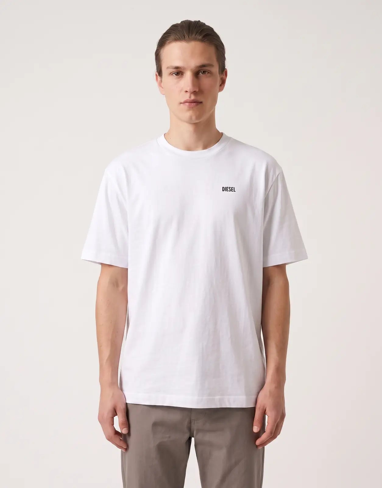 Front view of a men's Diesel T-Boggy V3 T-shirt 100 in white cotton, featuring a small black 'DIESEL' logo on the chest.