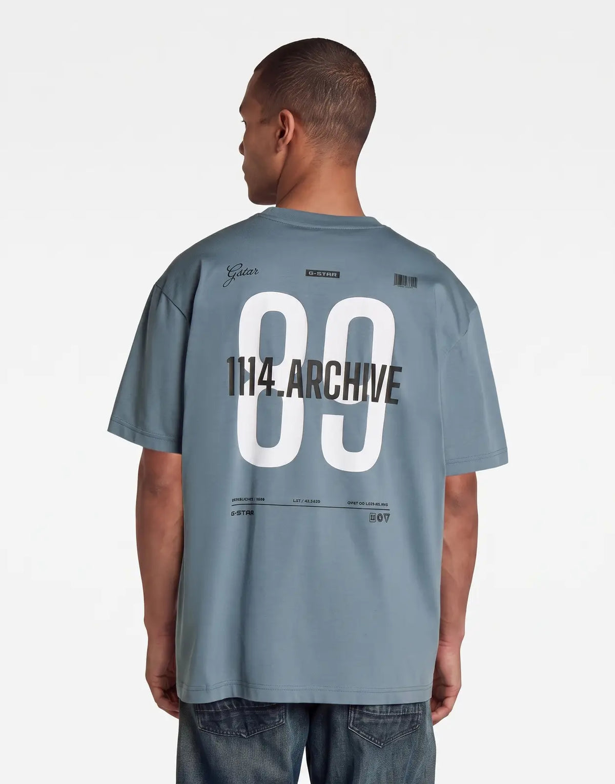 Men's G-Star RAW 89 Back Graphic Relaxed Grit T-Shirt in blue-grey, shown from the back with distinctive white '89' print.