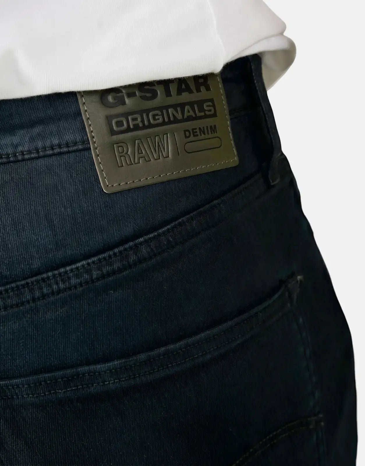 G-Star RAW Aged Slim Blue Cobler Jeans, detailed close-up of the back pocket and brand label.