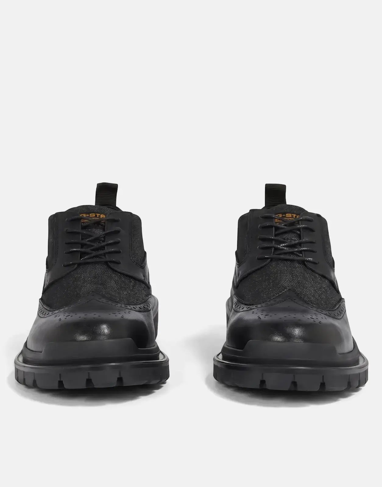 Black G-Star RAW Blake BRQ denim shoes with leather accents and chunky lug soles, presented frontally.