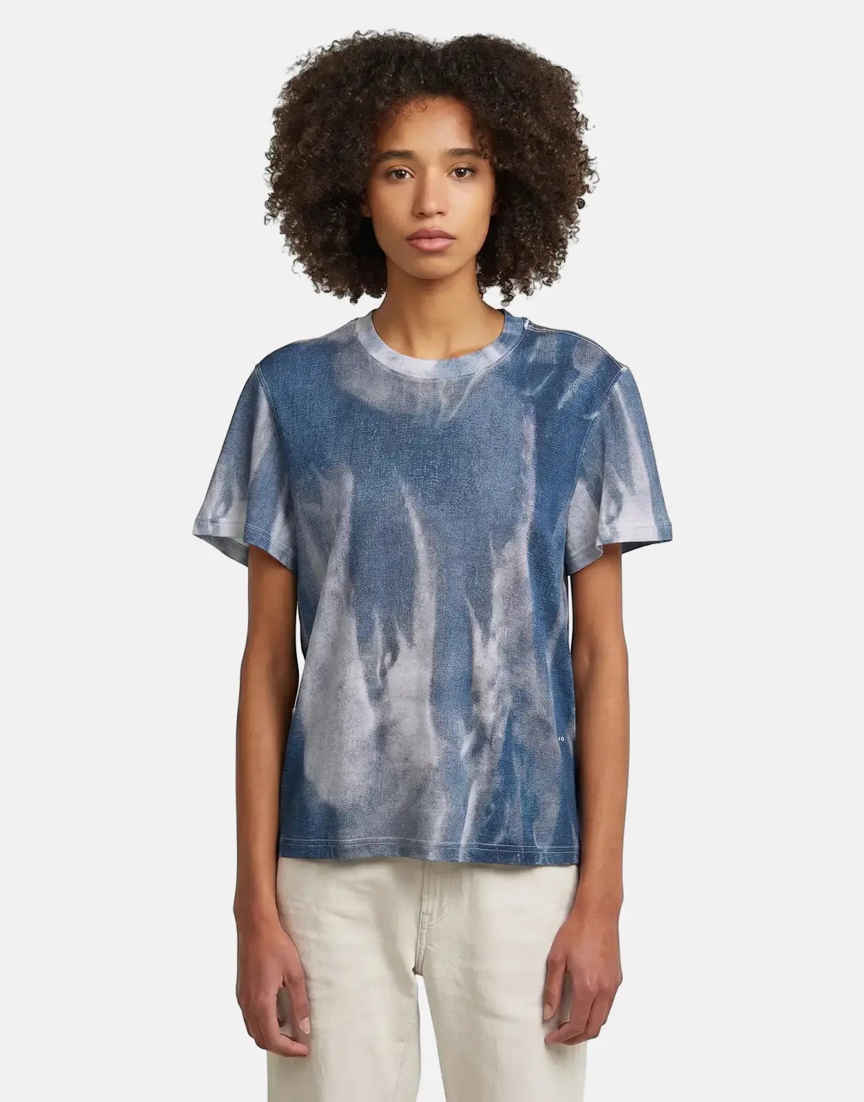 G-Star RAW Denim Print Denim Flame T-Shirt on a female model wearing light-colored pants, captured waist-up.