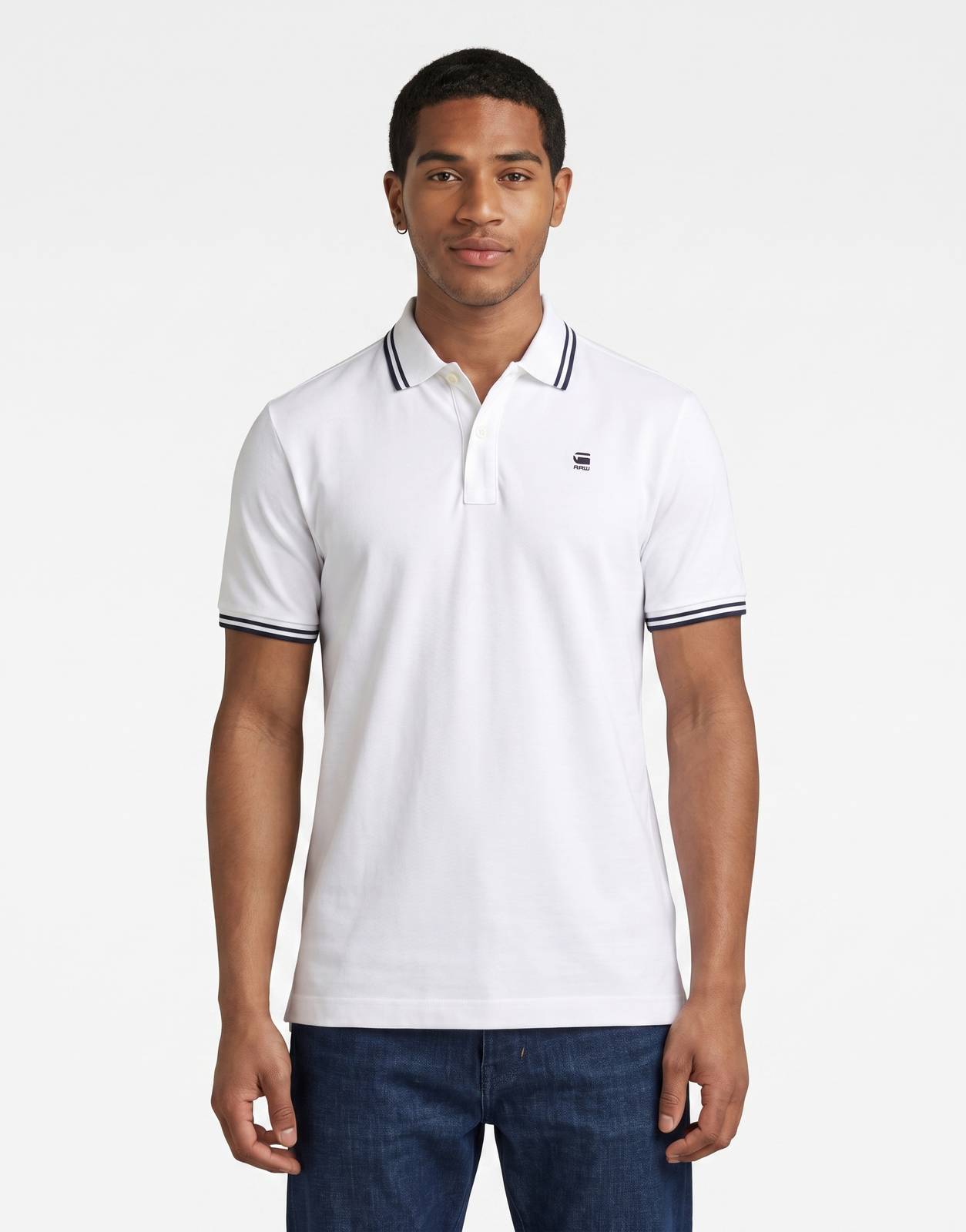 G-Star RAW Dunda Slim Stripe White Polo Shirt on a male model, front view. Features a classic collar and navy striped cuffs.