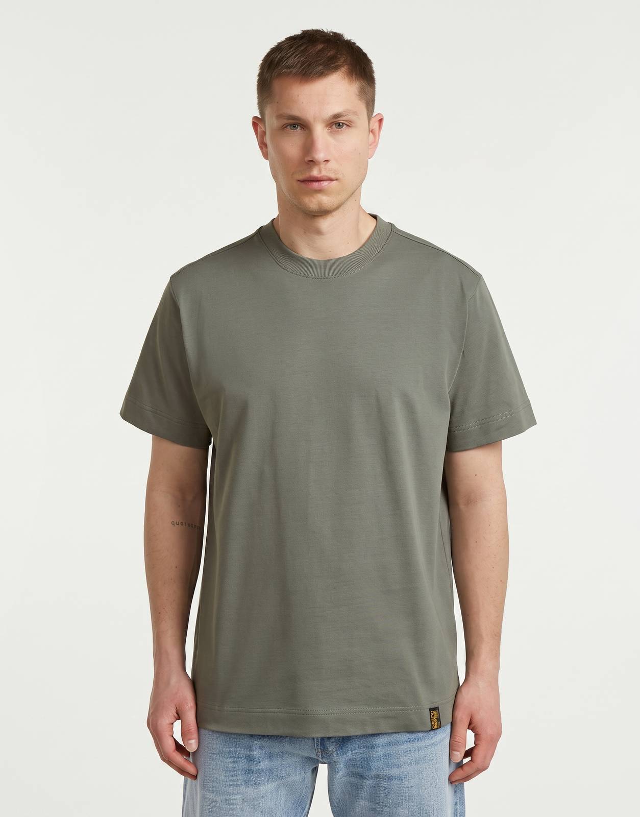 Front view of a G-Star RAW GS-01 Orphus T-Shirt in olive green, featuring a classic crewneck and short sleeves, worn by a