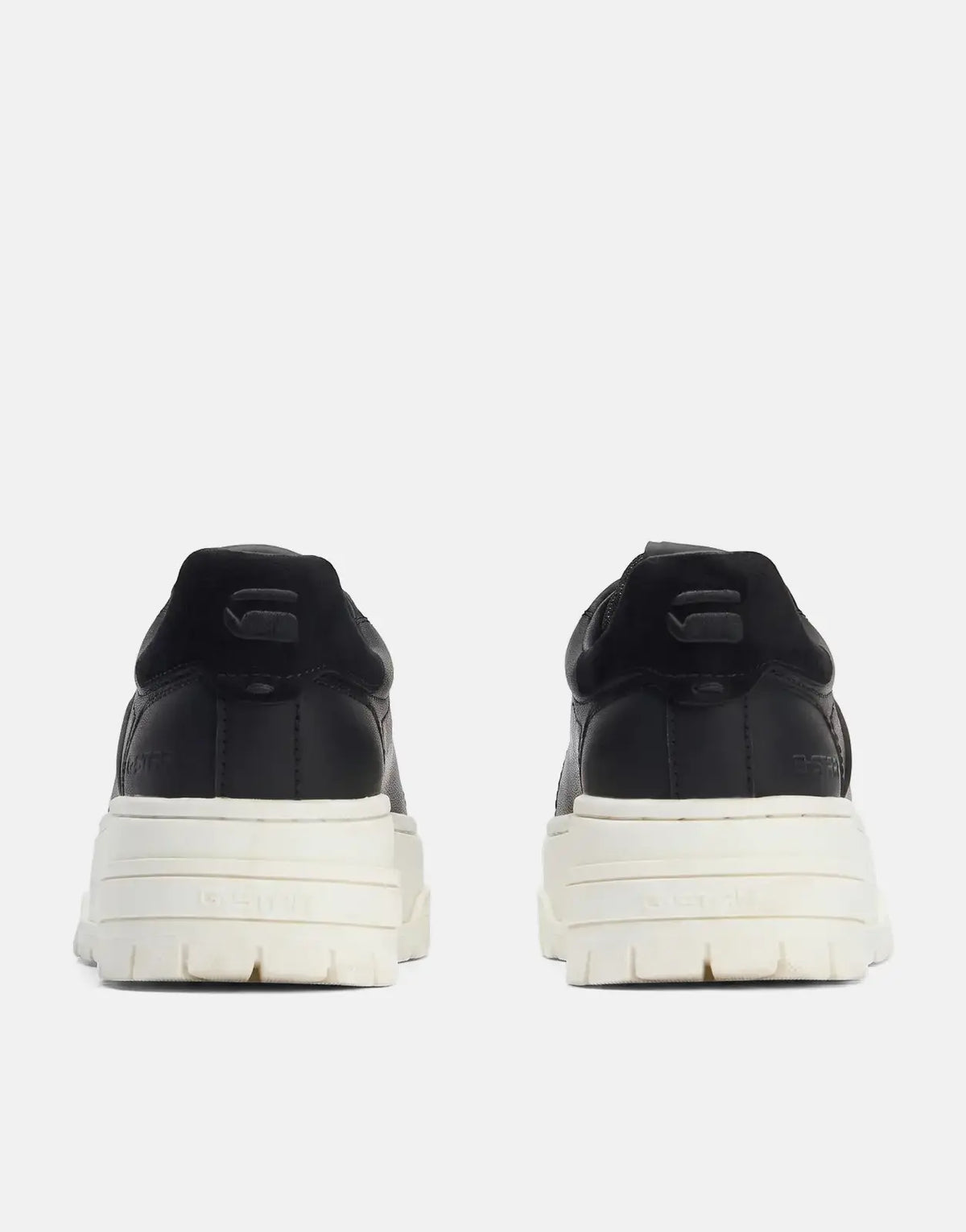 G-Star RAW Lhana VI BSC black sneakers with thick cream soles, featuring a rear view on a plain studio background.