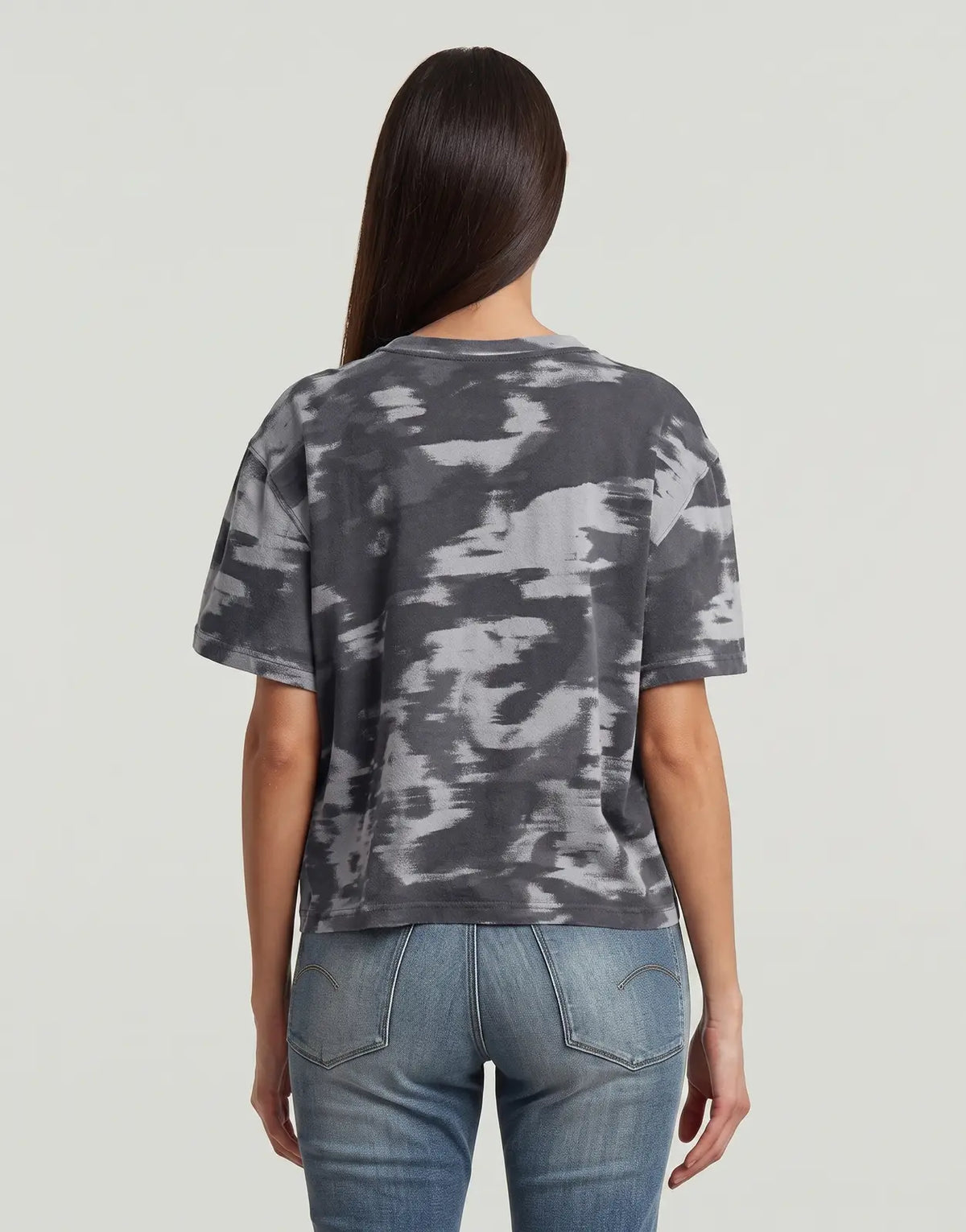 Back view of a women's G-Star RAW Regular Camo T-Shirt Keian Motion, featuring a dark grey and light grey tie-dye pattern.