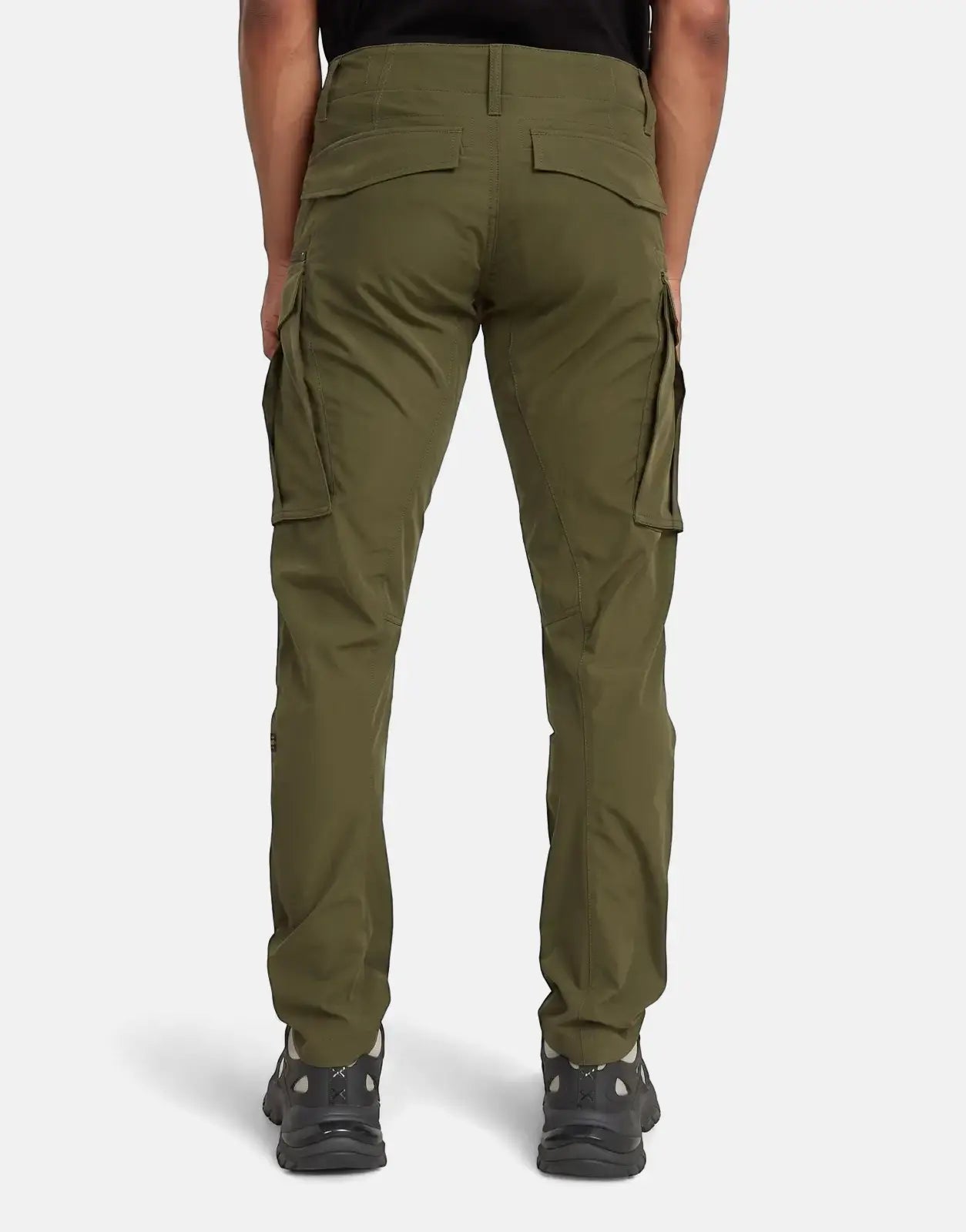 Men's G-Star RAW Rovic Zip 3D Regular Tapered cargo pants in shadow olive green, shown from the back on a model.