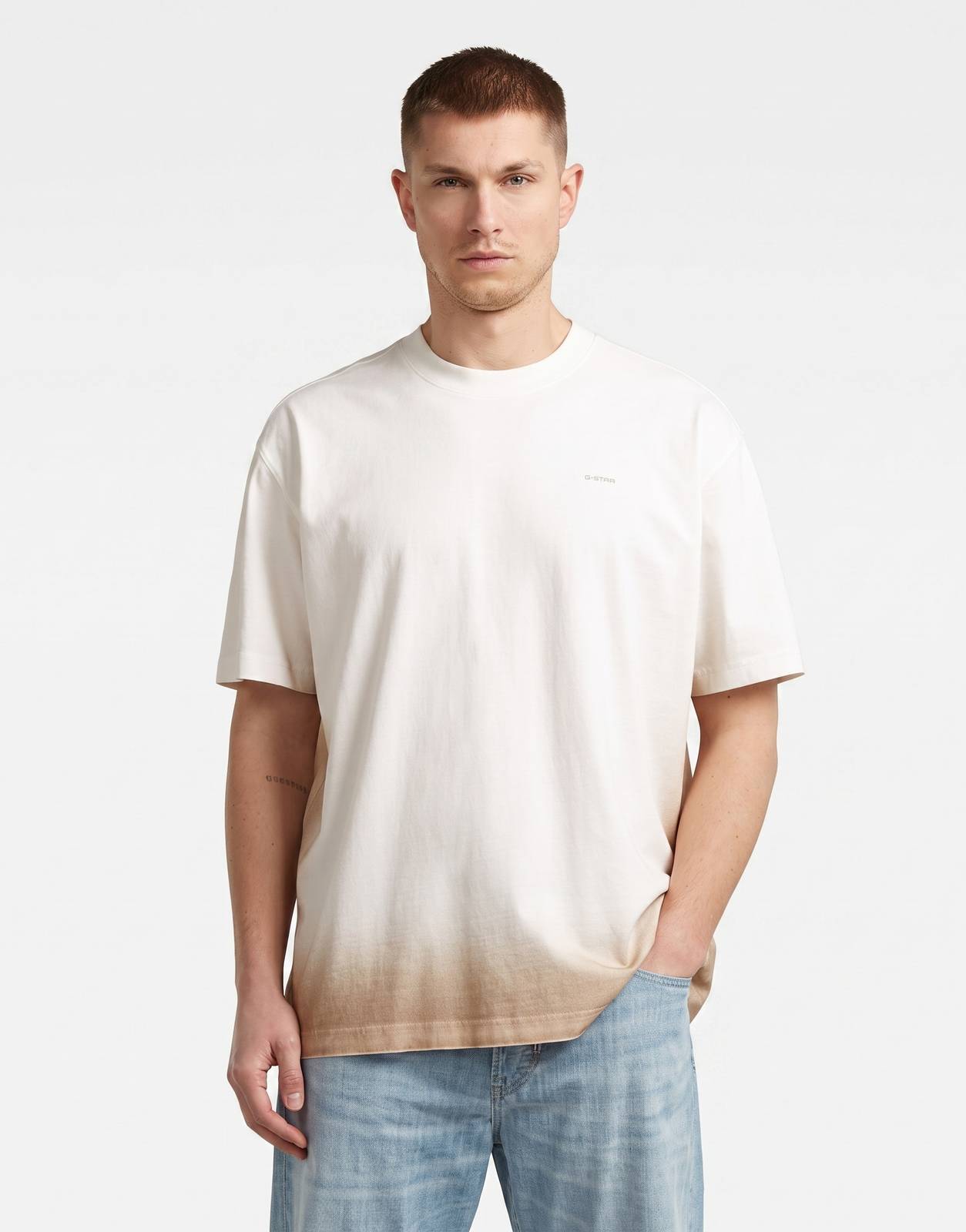 G-Star RAW Sprayed Relaxed T-Shirt in milk and dark brick spray effect, front view on male model.