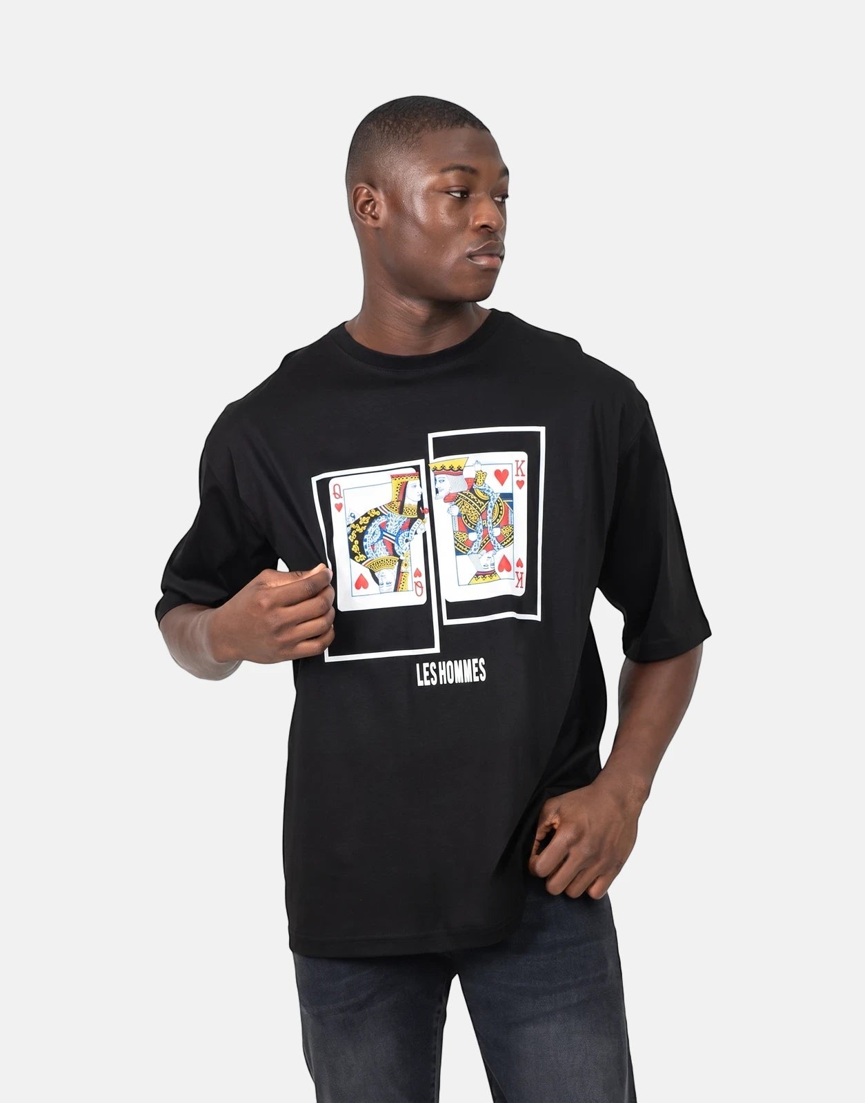 Les Hommes Queen King Black T-Shirt for men, featuring a playing card graphic print, worn by a model.