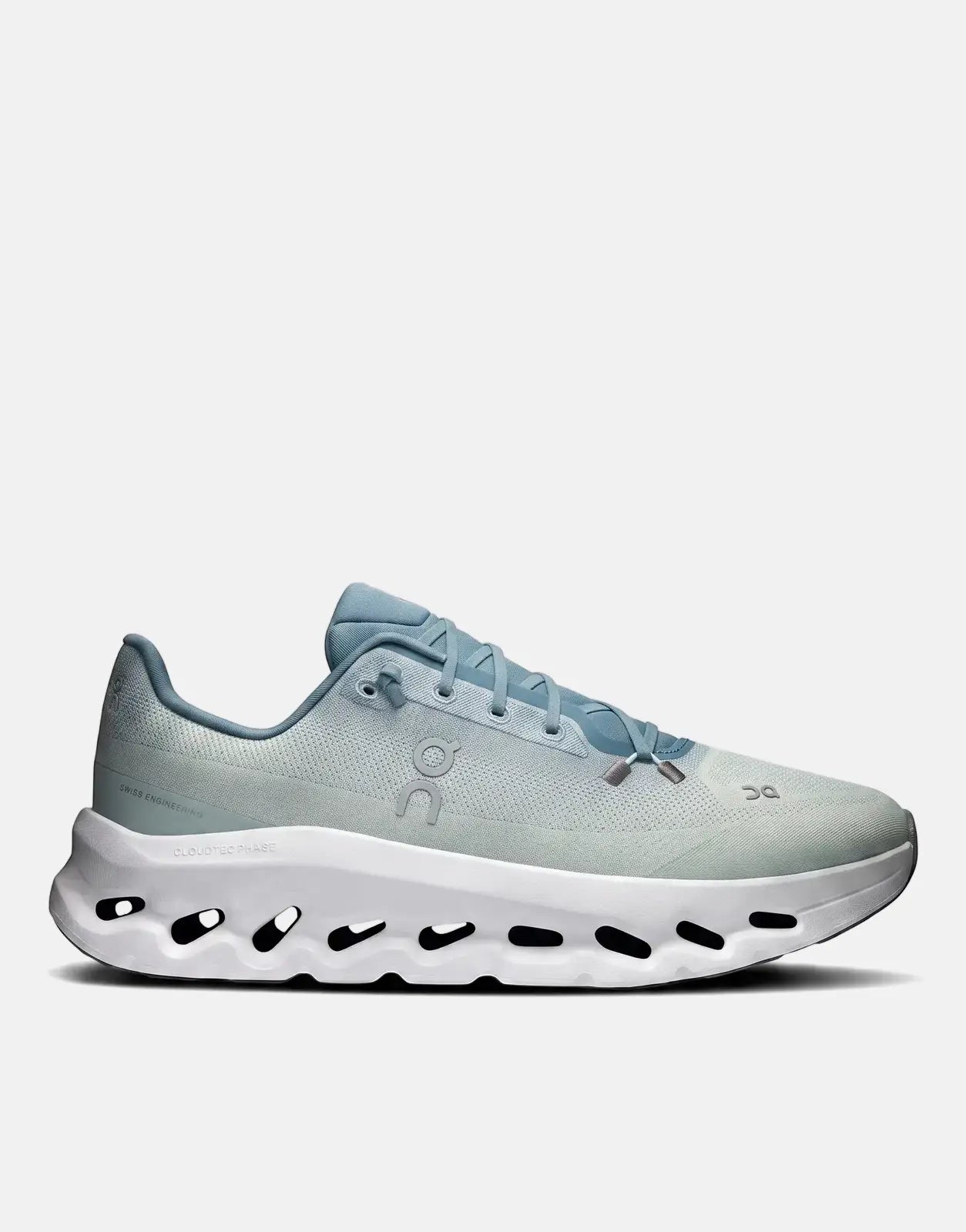 On Men's Cloudtilt Tide Mineral sneaker in light blue with a distinctive white CloudTec Phase sole, shown in a side profile