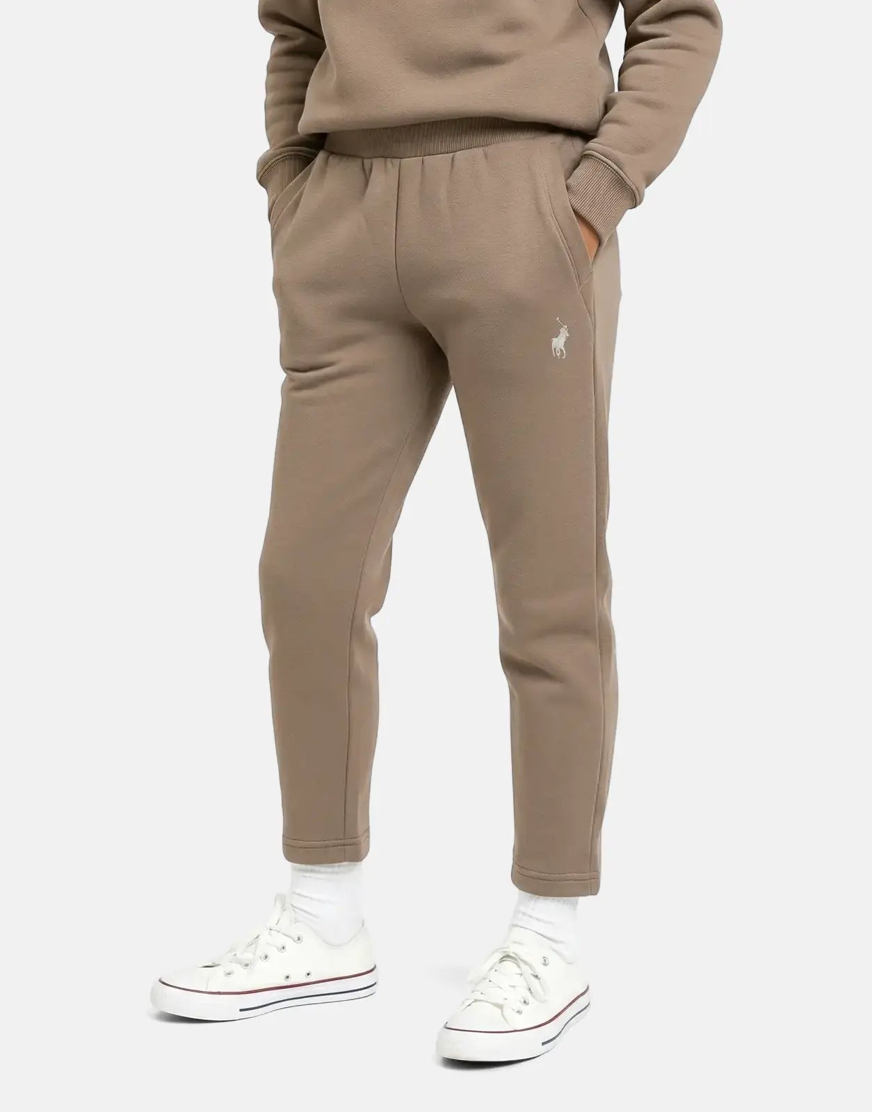 Polo Girls Kim Pull On Iron Jogger in brown, featuring the polo player logo, paired with white socks and sneakers.