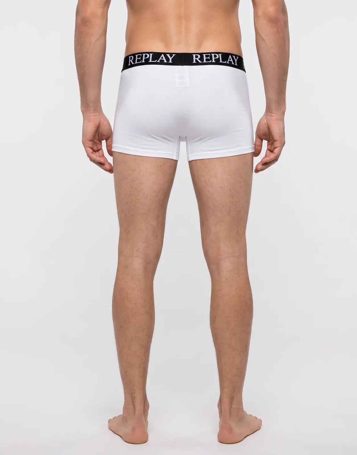 Back view of Replay men's 3-pack white cotton boxer briefs on a mannequin, featuring a black elastic waistband with the