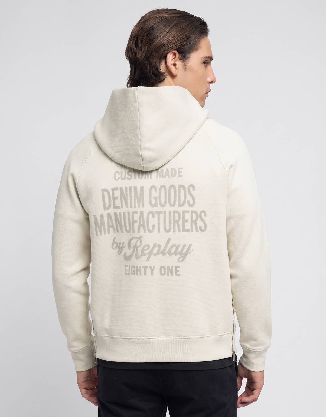 Cream Replay Full-Zip Logo Hooded Cloud Sweatshirt, worn by a male model, with a detailed brand slogan print on the back.