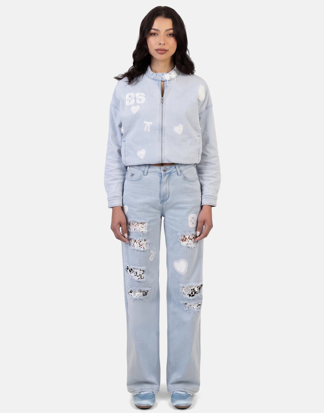 Sissy Boy Kiera wide leg light vintage jeans and matching denim jacket with intricate lace applique details, worn by a