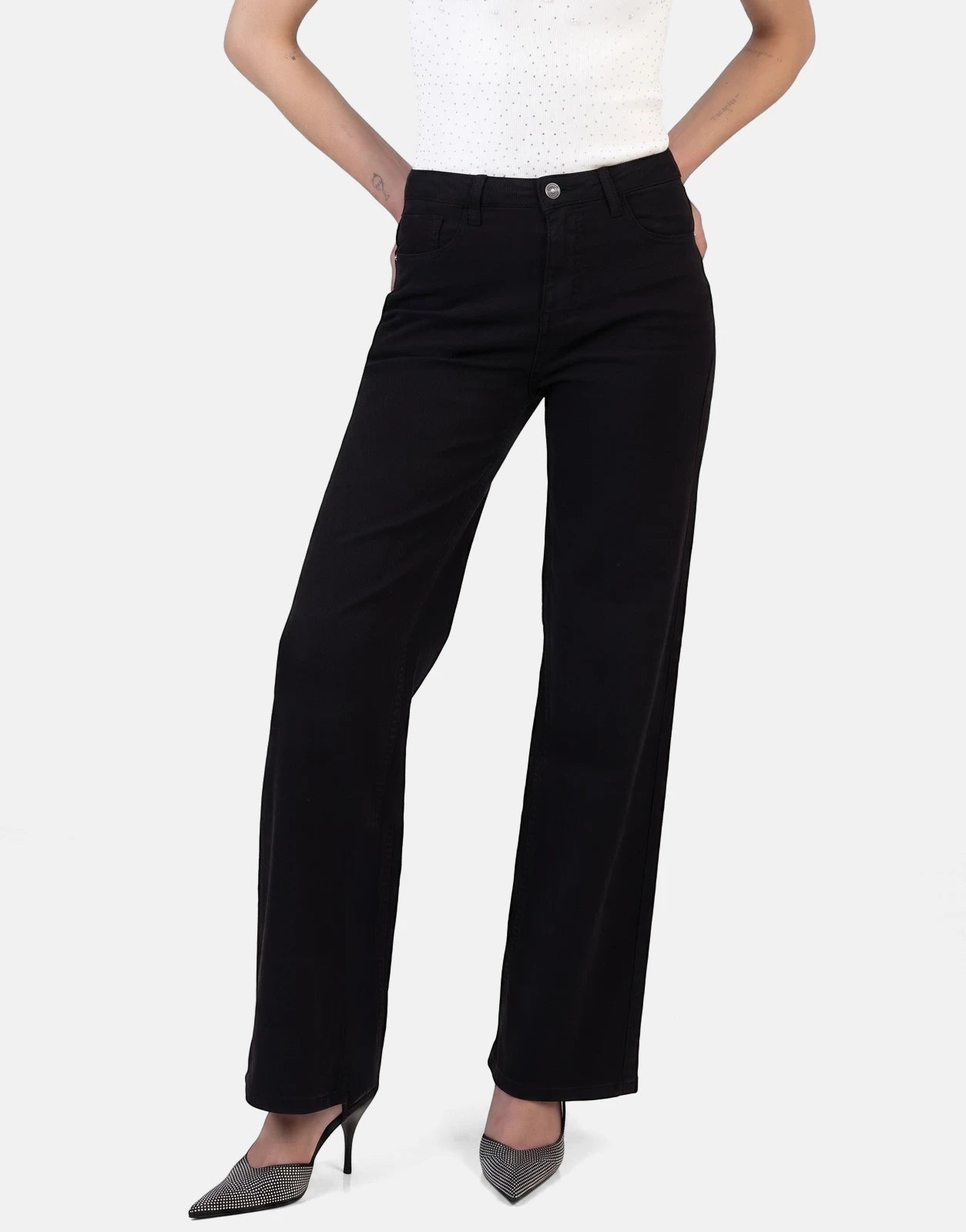 Sissy Boy Nollene black high waist wide leg jeans, worn by a model, showcasing the fit and rhinestone embellished heels.