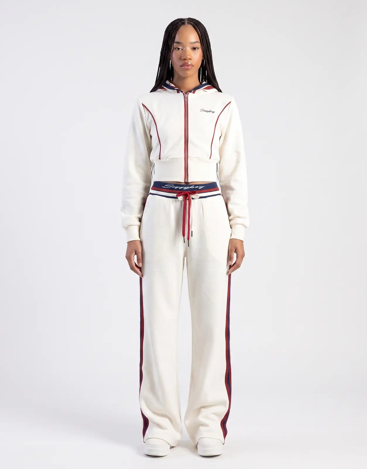 Sissy Boy Off Your Game cream wide leg sweatpants and matching cropped zip-up hoodie with red and navy stripe details.