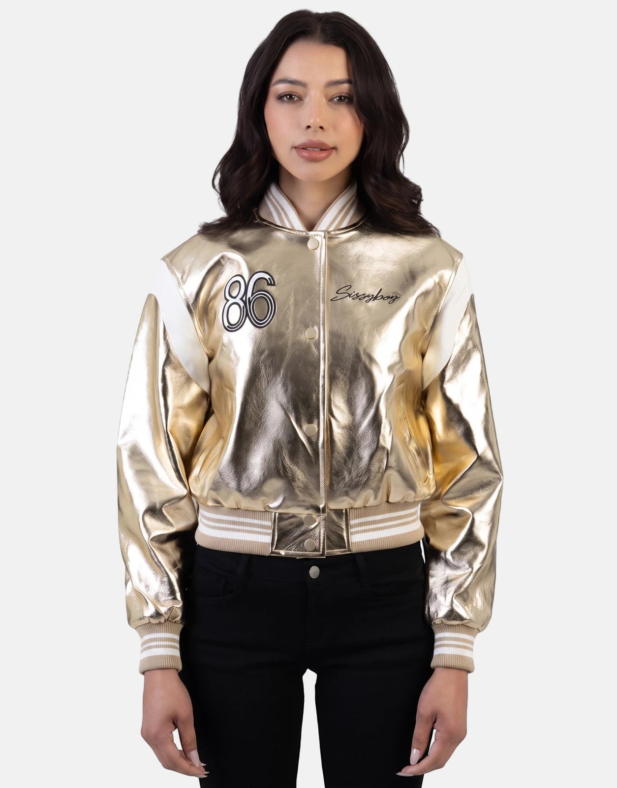 Sissy Boy Take It Easy Gold Bomber Jacket on a female model, featuring white sleeves and striped trim.