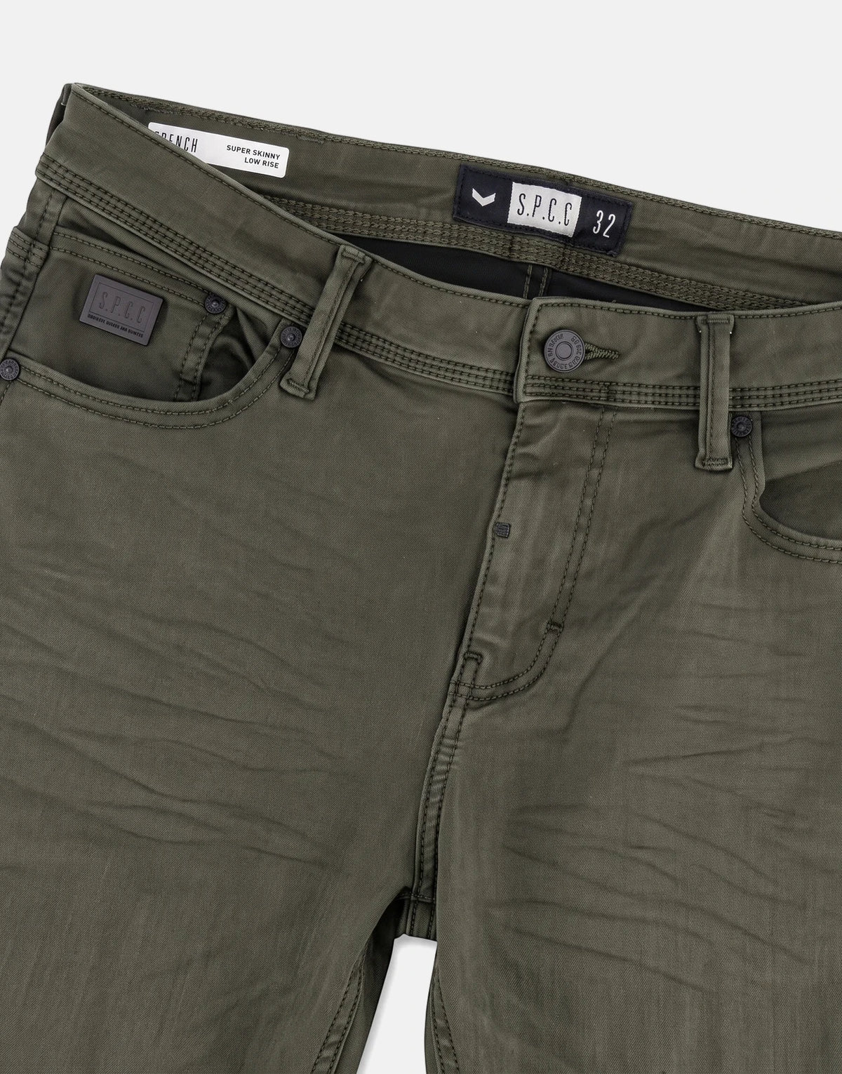 Close-up front view of olive green SPCC Rodan Redrafted Fatigue Jeans, showcasing the fly, pockets, and branded details.