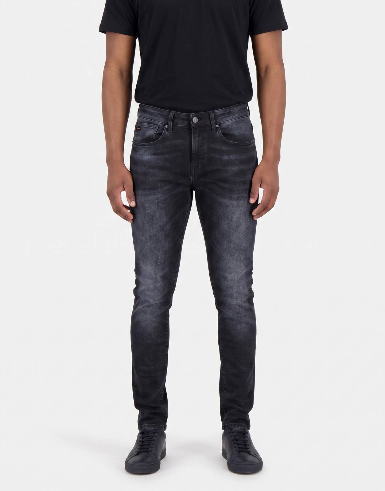 Men's TSHEPO Takalani C1 Mid Indigo Jeans, featuring a dark wash with subtle fading and a slim fit, shown from the front.