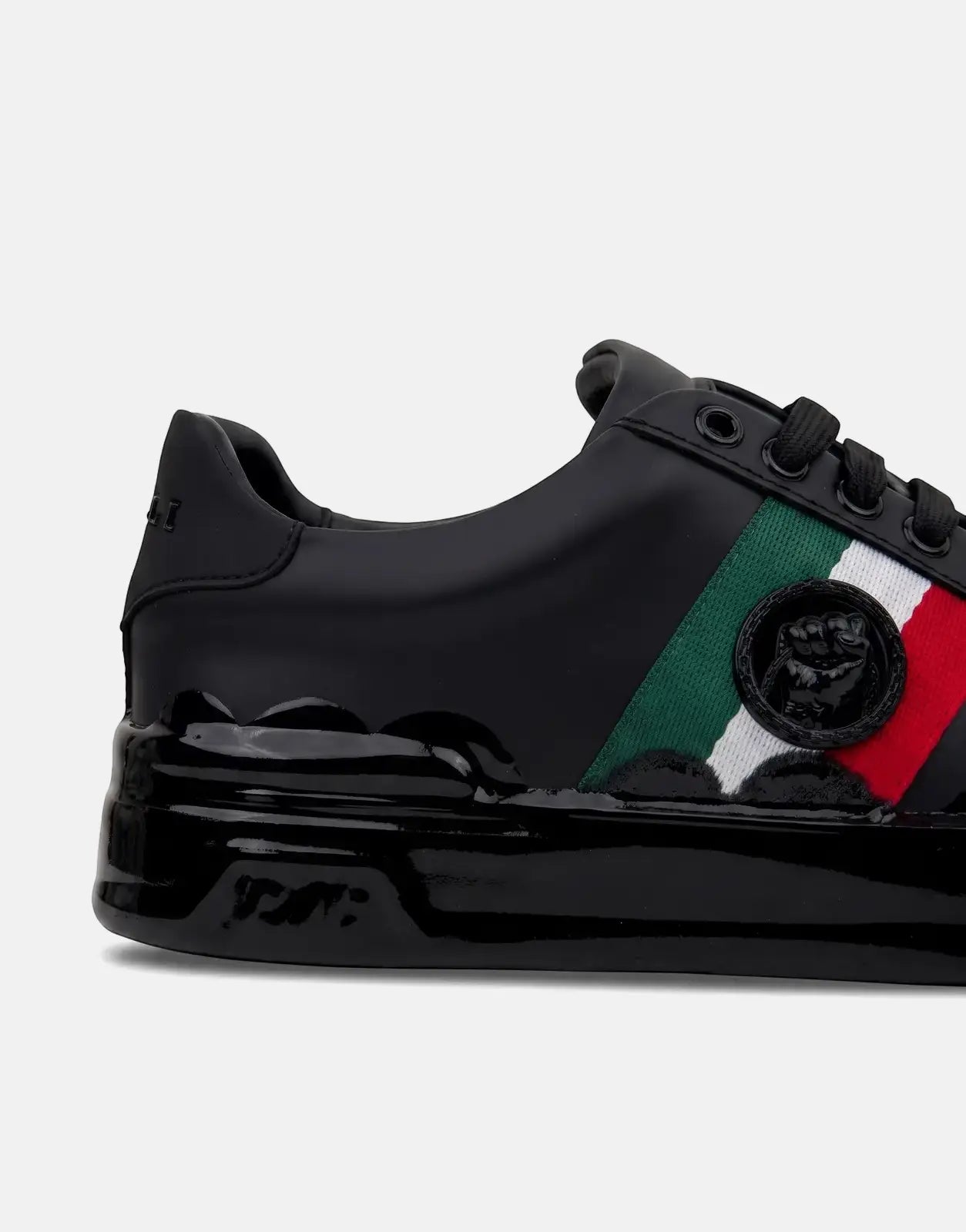 Vialli Rubai sneakers in black featuring a green, white, and red stripe on the side and a glossy black sole.