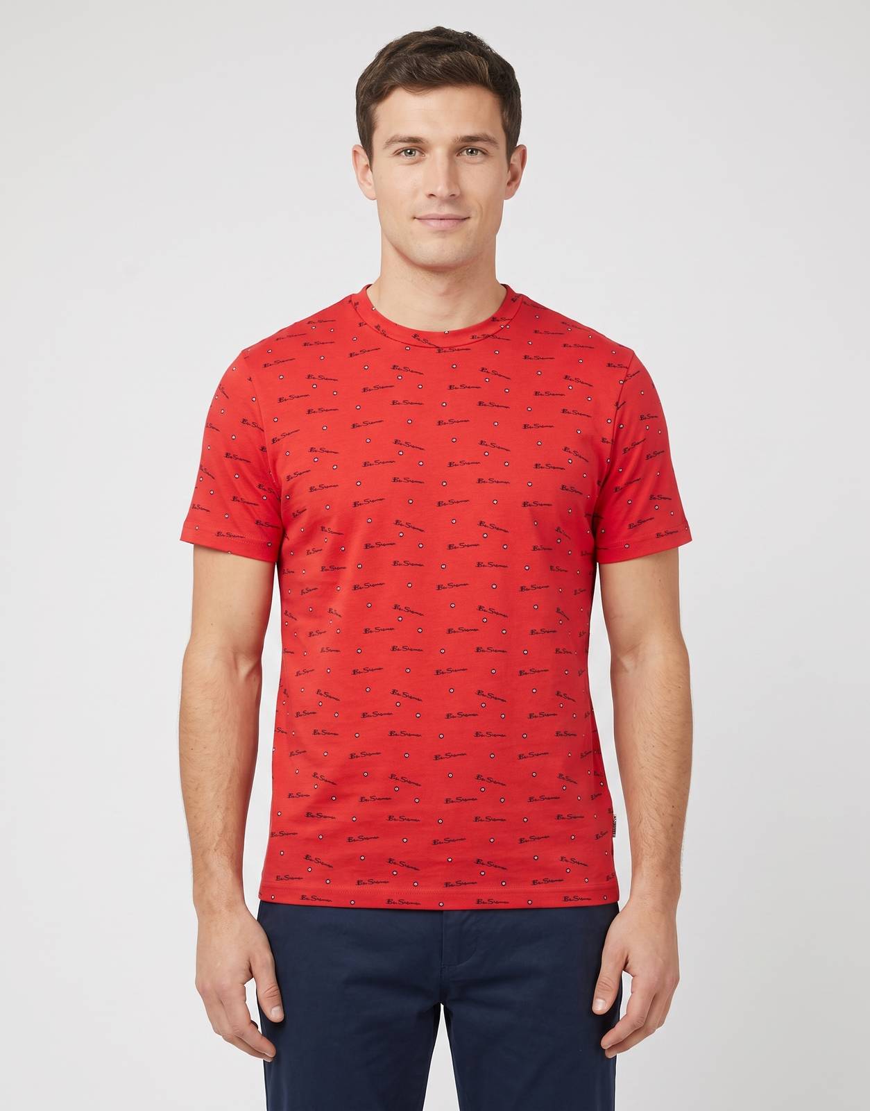 Ben Sherman Tar Aop Red T-Shirt featuring an all-over black script logo and dot pattern, displayed in a front view.