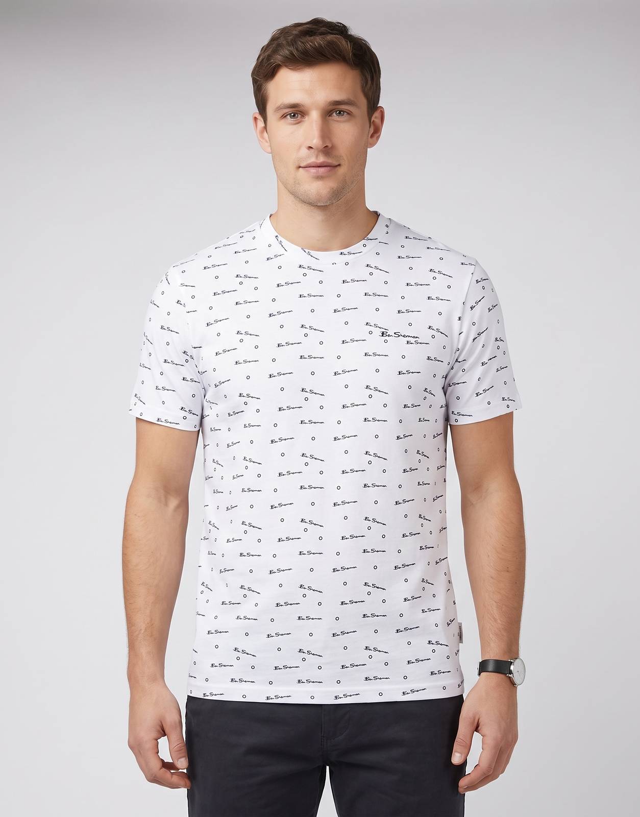 White Ben Sherman Tar all-over print short-sleeve T-shirt featuring black logo text and circular graphics, presented flat.