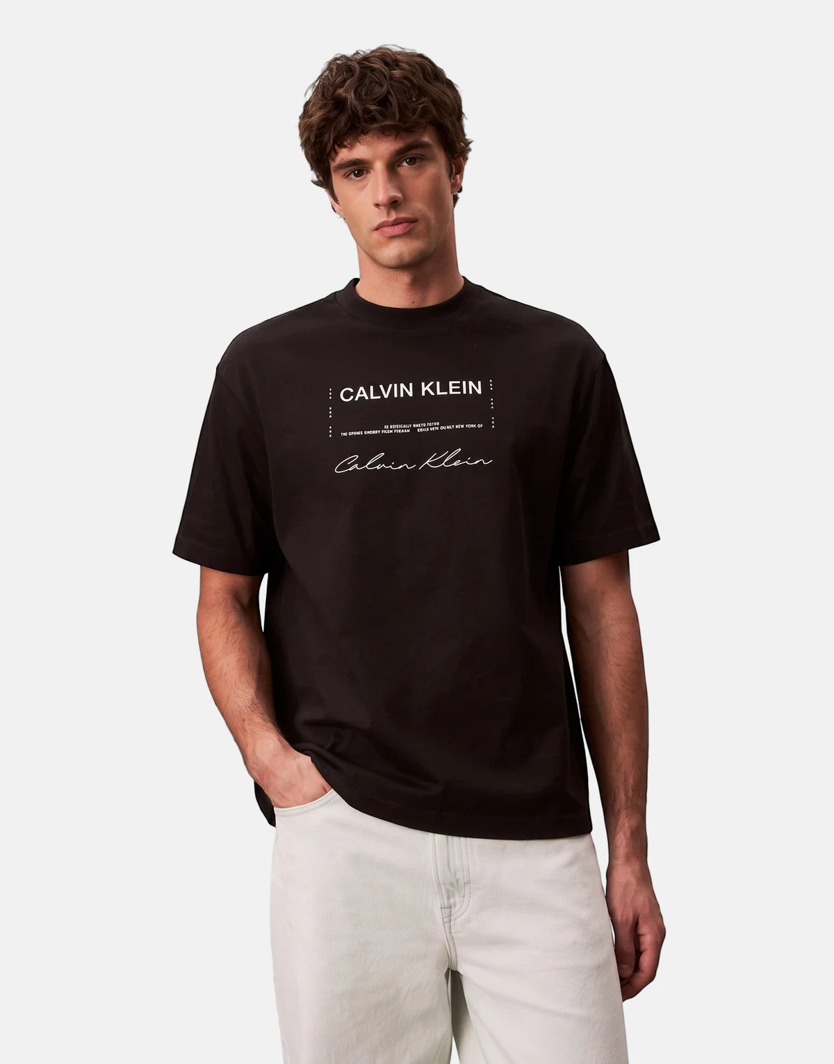 Men's Calvin Klein 16s April Graphic Seasonal Fashion black t-shirt, short-sleeve, worn by a model in a front view.