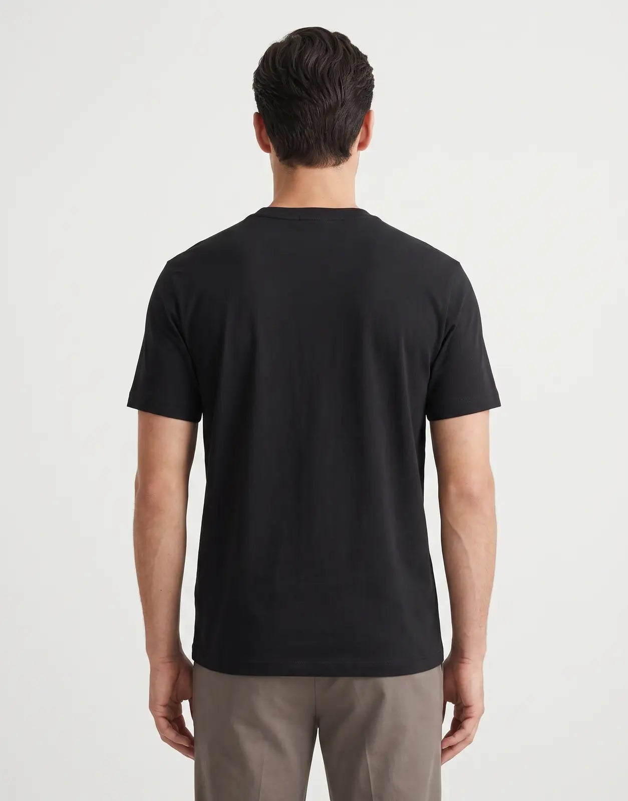 Calvin Klein 30s Graphic black t-shirt, featuring a plain back view, made from soft cotton fabric.
