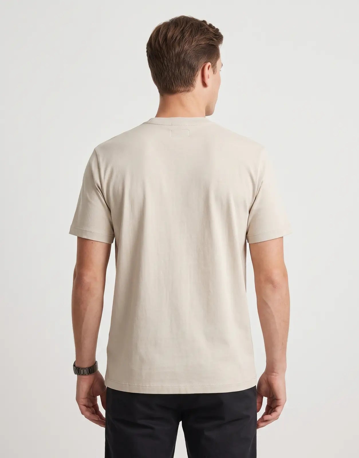 Calvin Klein 30s Wholesale Jeans Graphic Beige T-Shirt with short sleeves and a relaxed fit